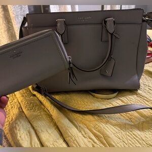 Gray Kate spade bag and wallet